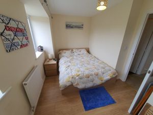 Bedroom One- click for photo gallery